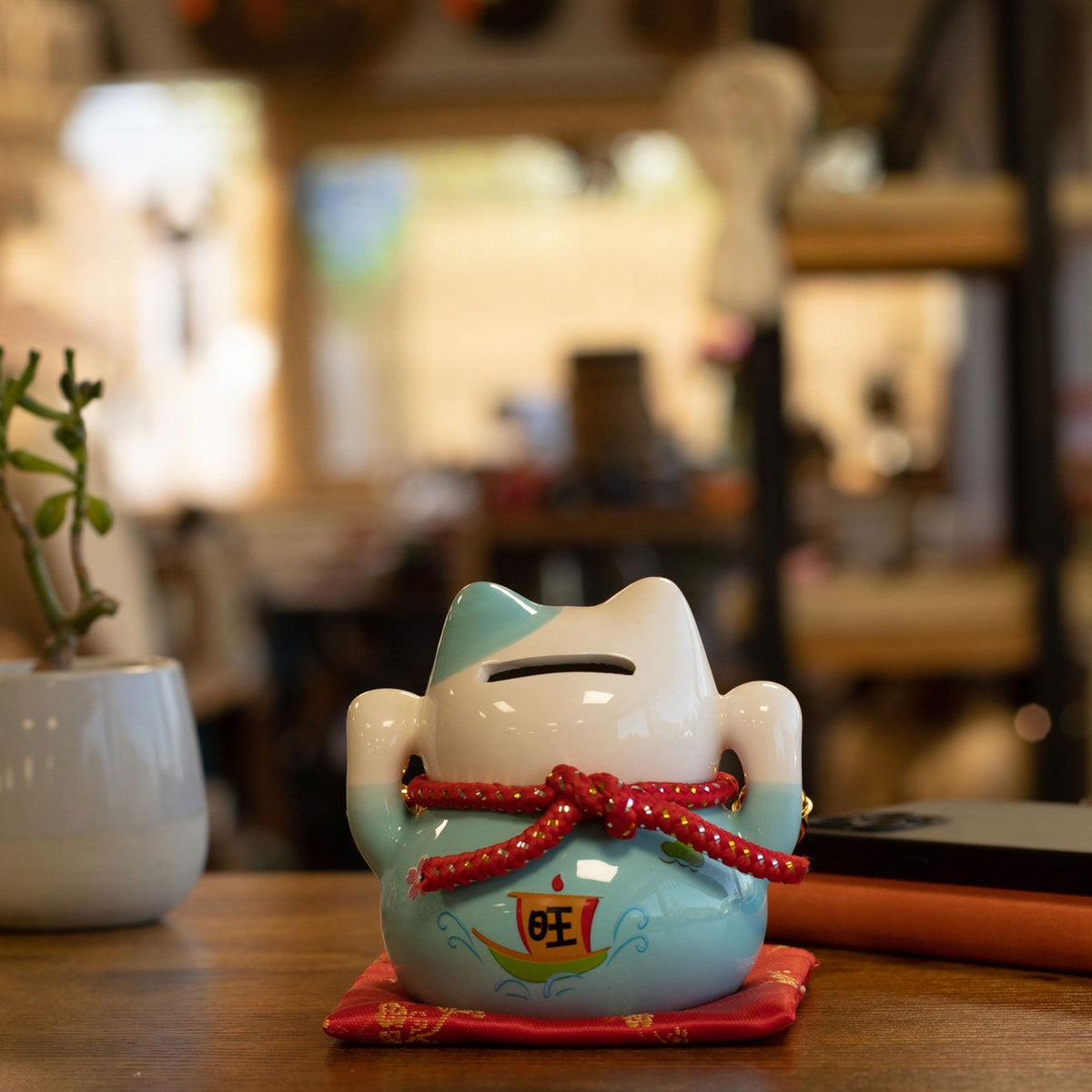 Ceramic Money Cat Bank - Blue on Cushion