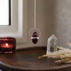 Shiva Lingam with Band Pendulum