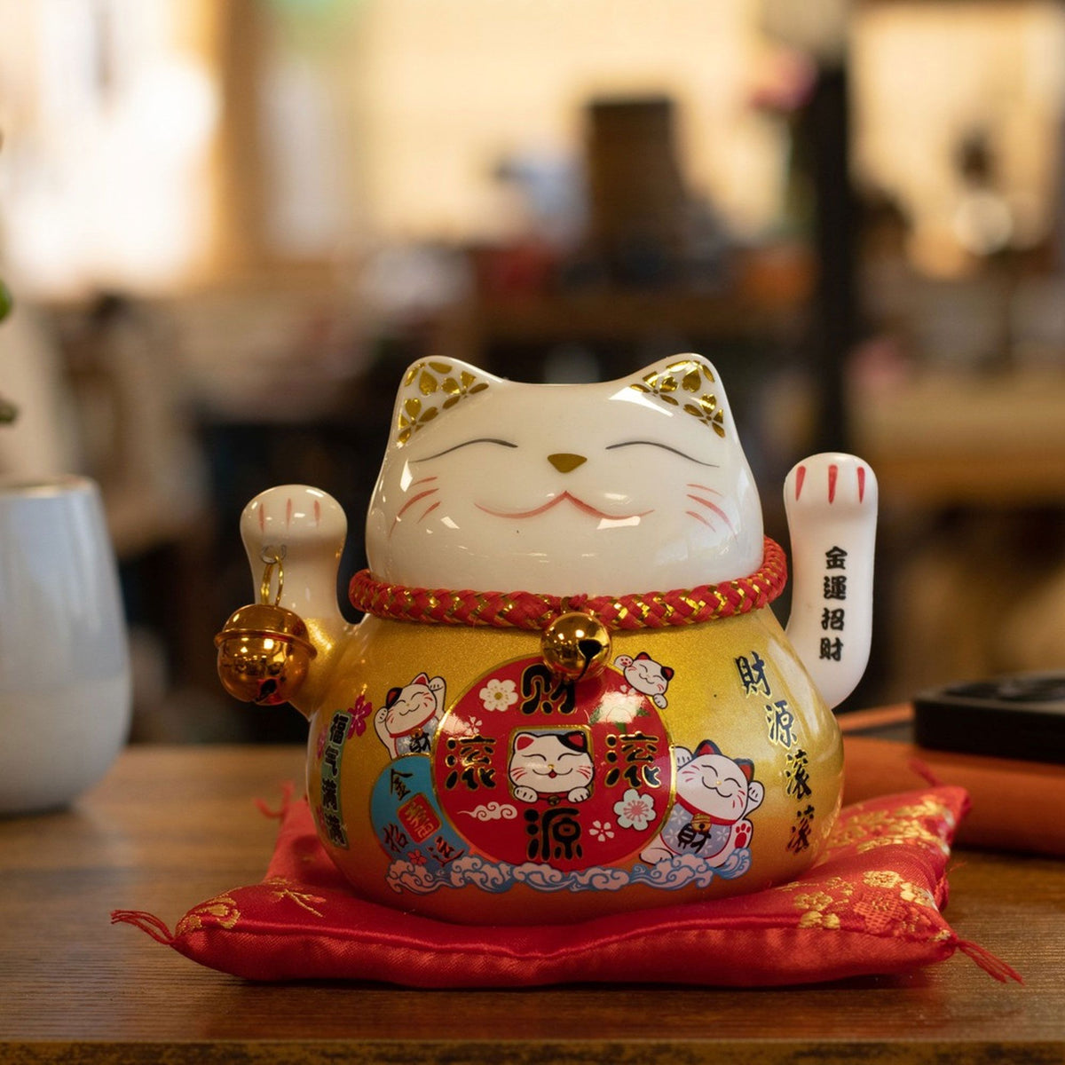 Ceramic Money Cat Moving Hand  - Gold on Cushion
