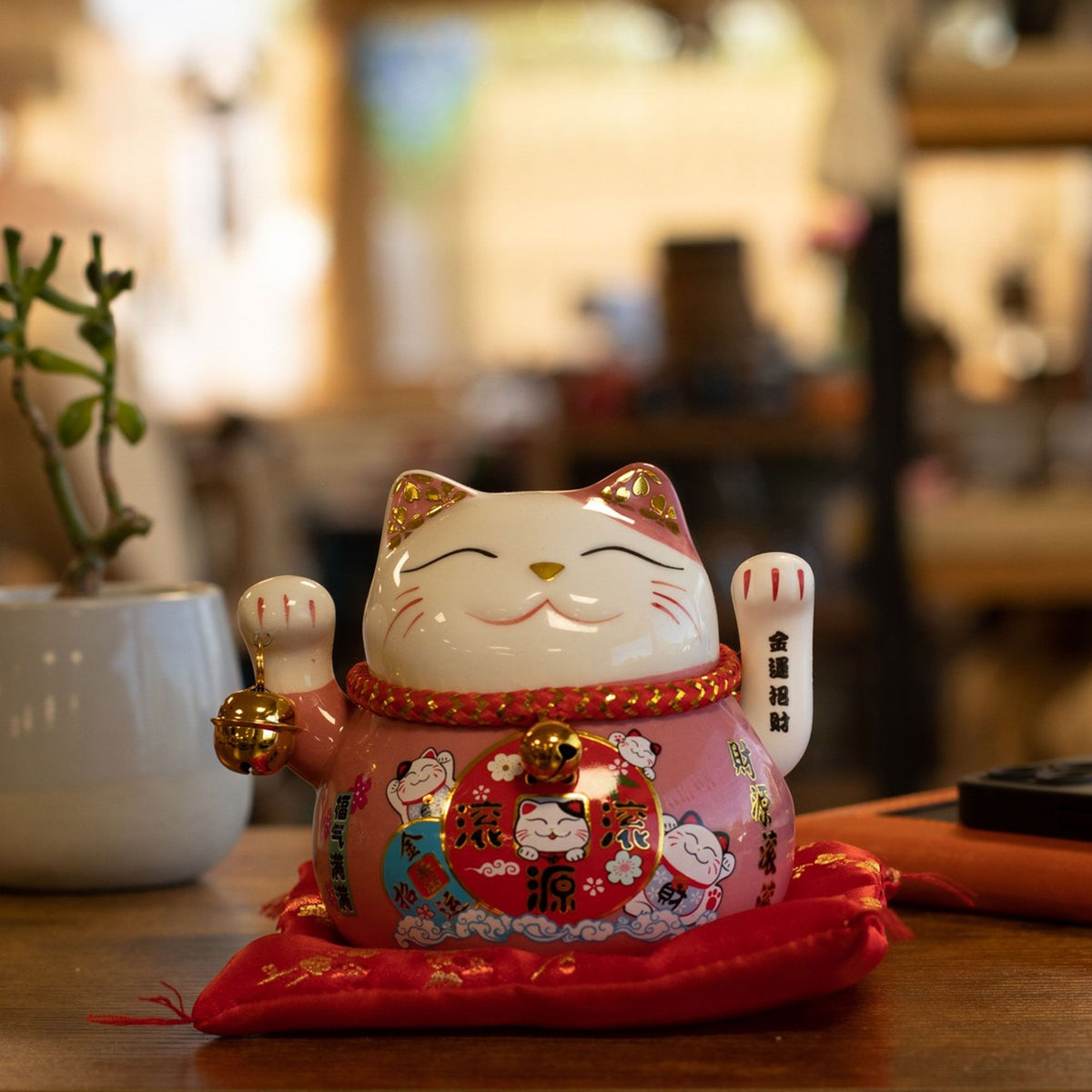 Ceramic Money Cat Moving Hand  - Pink on Cushion