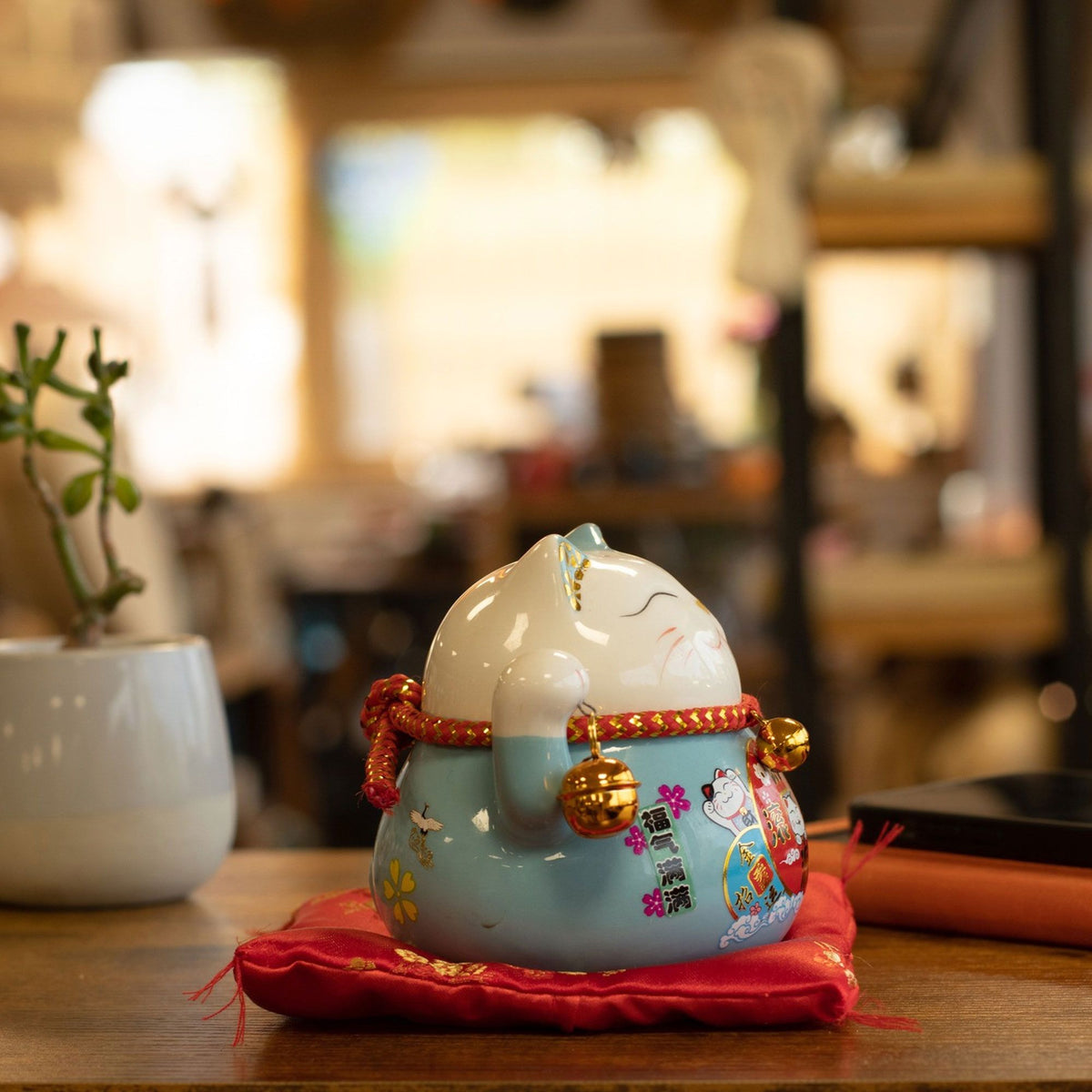 Ceramic Money Cat Moving Hand  - Blue on Cushion